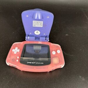 Pink Nintendo Game Boy Advance GBA Console with screen light